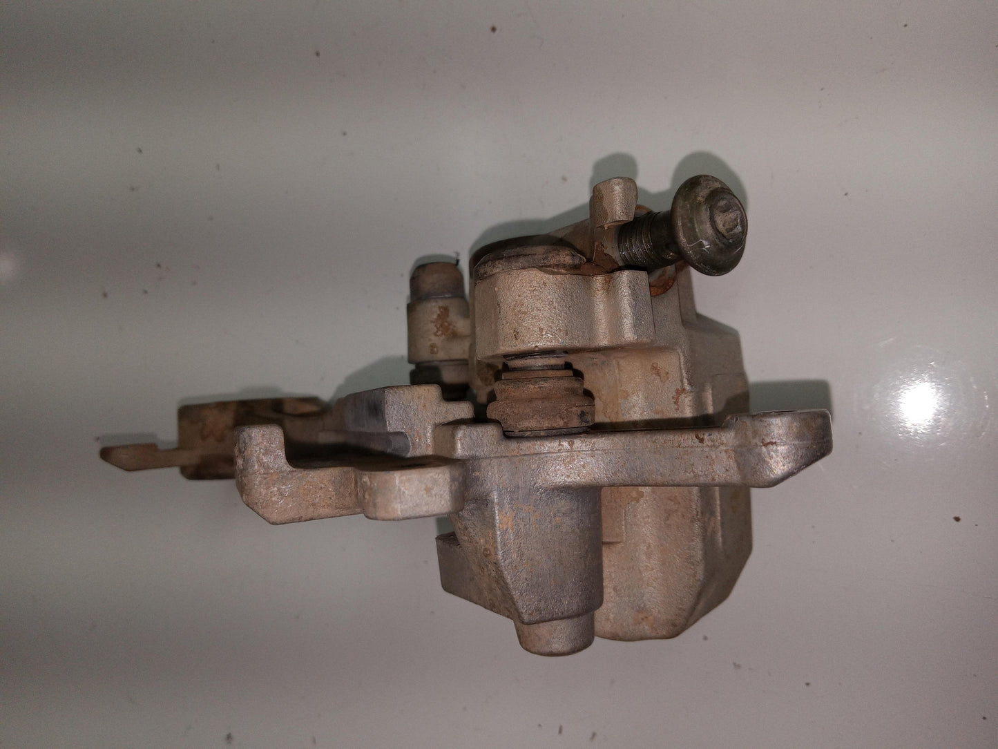 2003 YAMAHA WR450F OEM REAR BRAKE CALIPER HANGER BACK MOUNTING BRACKET