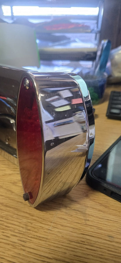 Used V-Twin Chrome Curved Cateye-Style Tail Lamp Assembly 33-0690
