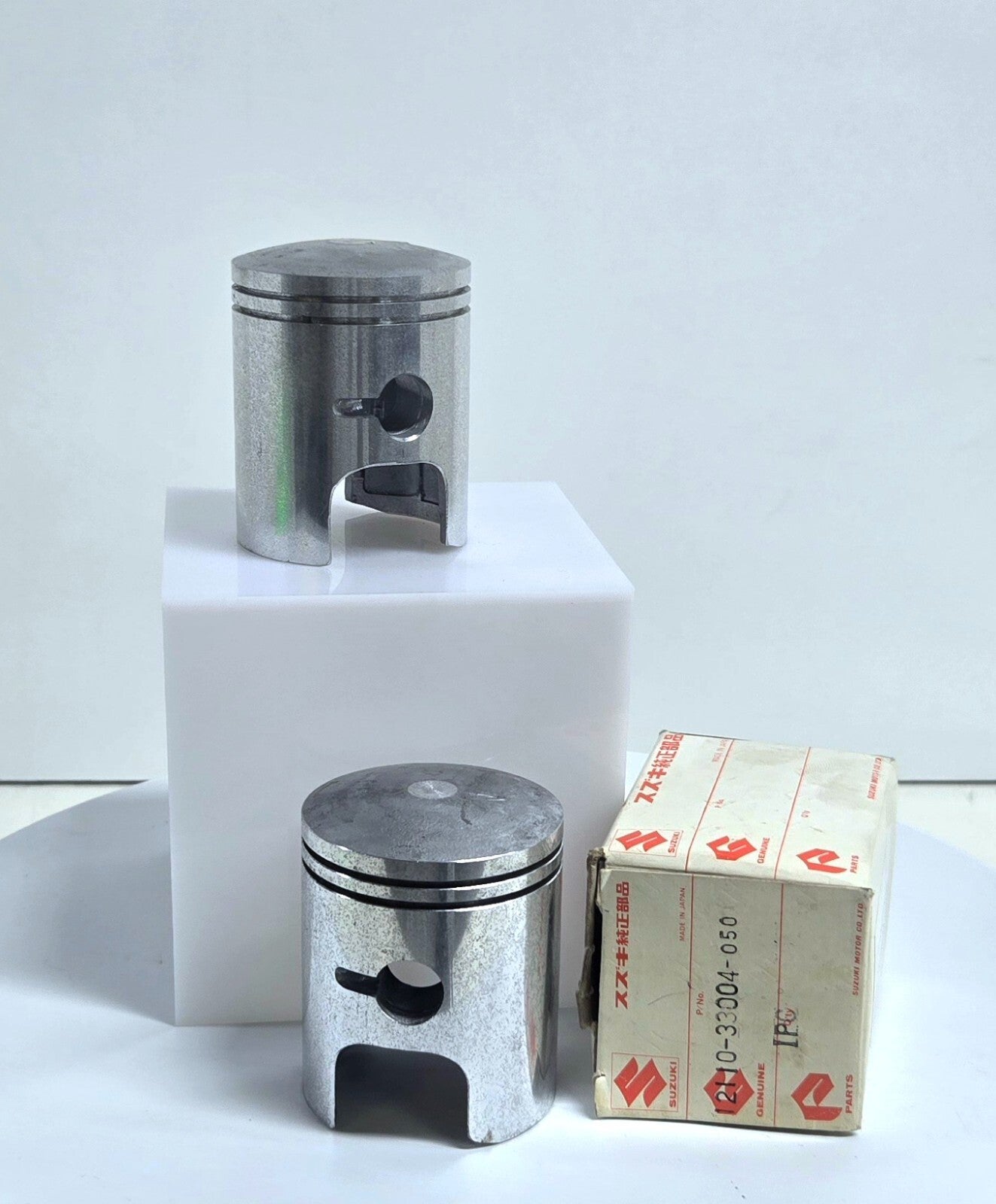 New Old Stock Suzuki Pistons, Rings not included